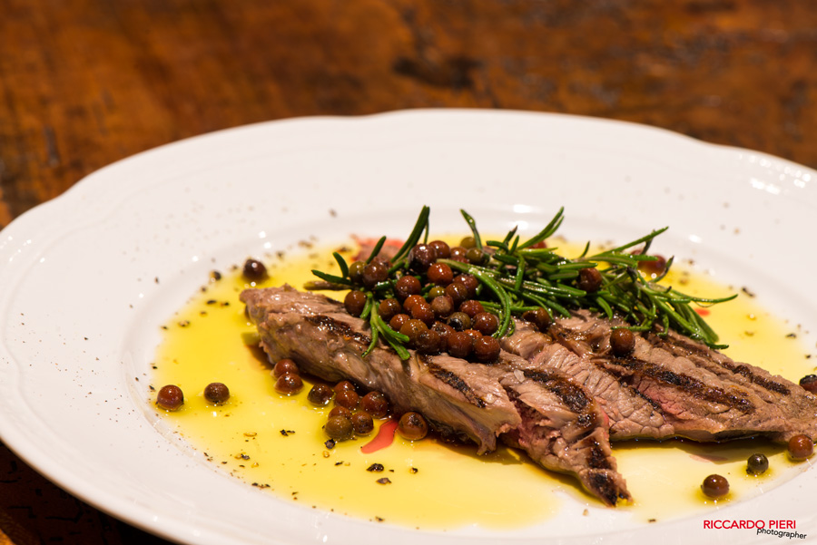 Sliced beef {tagliata} with rosemary and pink pepper - very tasty and aromatic