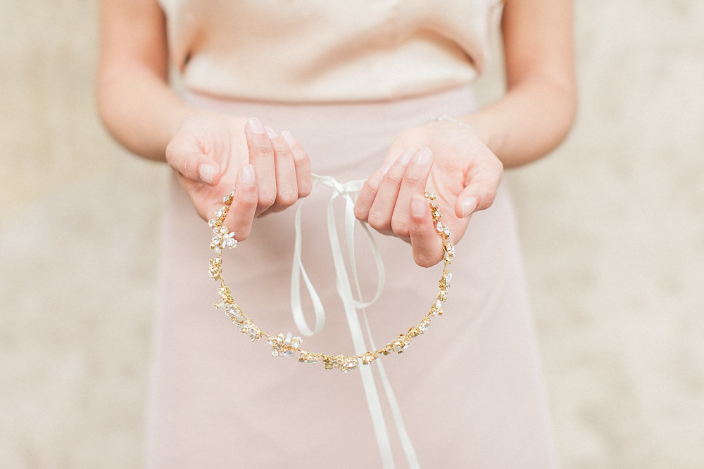 The sophisticated bride-to-be wore a two piece blush pre-wedding party gown that was tailored for the occasion and paired perfectly with a spectacular hand crafted bridal hair vine by Sibo Designs.