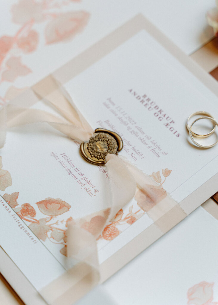 Pastel terracotta and caramel palette wedding invites